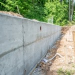 Construction mur fondation.