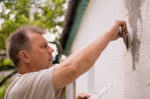 Mur parpaing crépi